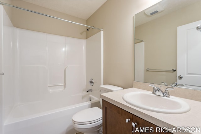 full bathroom with washtub / shower combination, toilet, and vanity