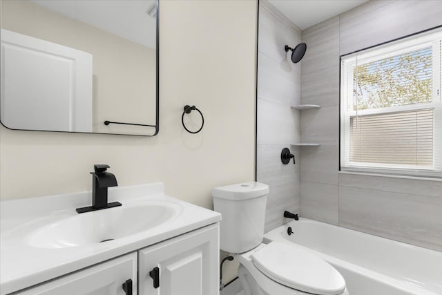 bathroom with vanity, toilet, and shower / washtub combination