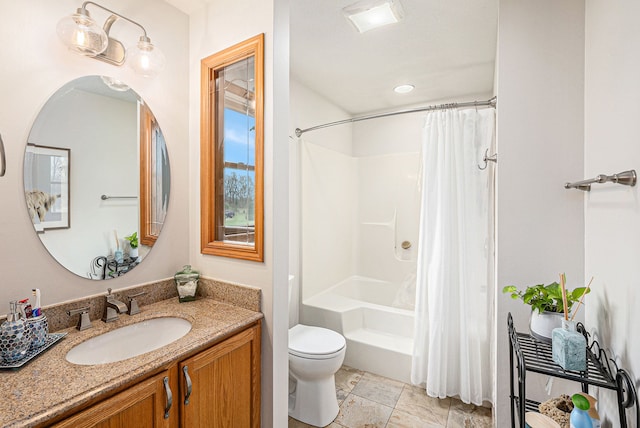 full bath featuring vanity, toilet, and shower / tub combo