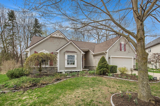 view of front of home featuring a front lawn, a shingled roof, and concrete driveway