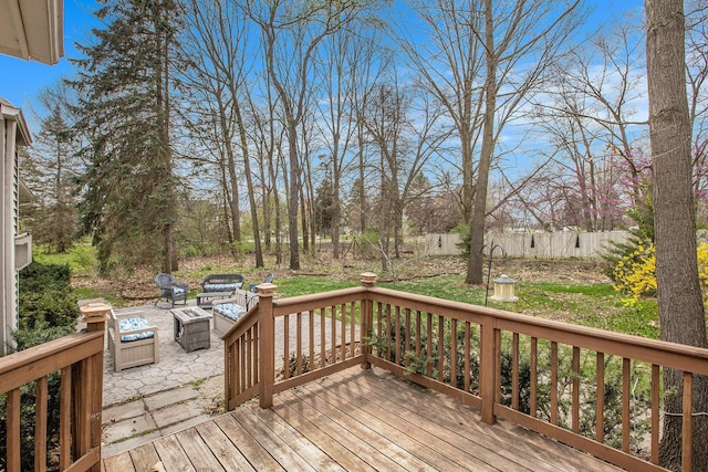 deck featuring fence and an outdoor fire pit