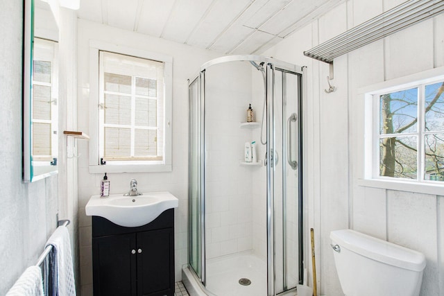 350 Ferry St, Douglas, MI 49406 - full bathroom featuring a shower stall, toilet, and vanity