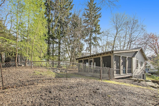 350 Ferry St, Douglas, MI 49406 - exterior space featuring a fenced backyard and a sunroom