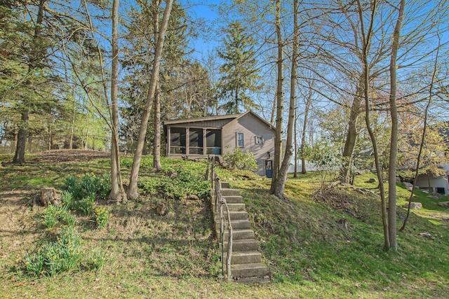 350 Ferry St, Douglas, MI 49406 - view of yard featuring a sunroom