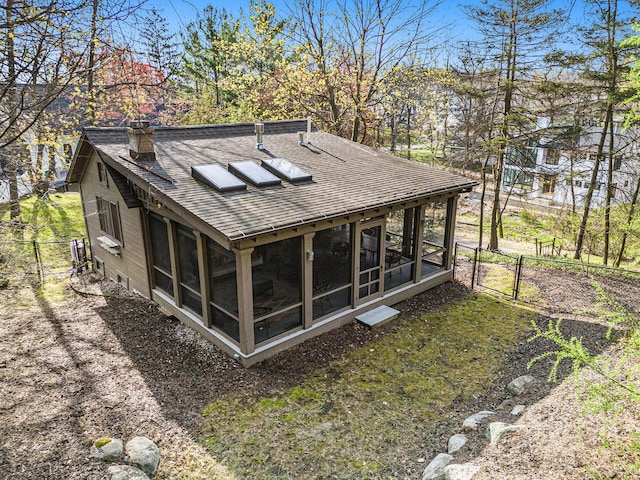 350 Ferry St, Douglas, MI 49406 - exterior space with a sunroom, a gate, and fence