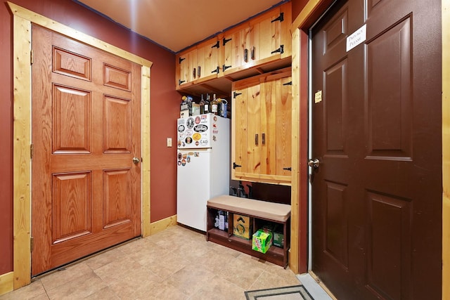 320 Marble St, Cadillac, MI 49601 - mudroom with baseboards