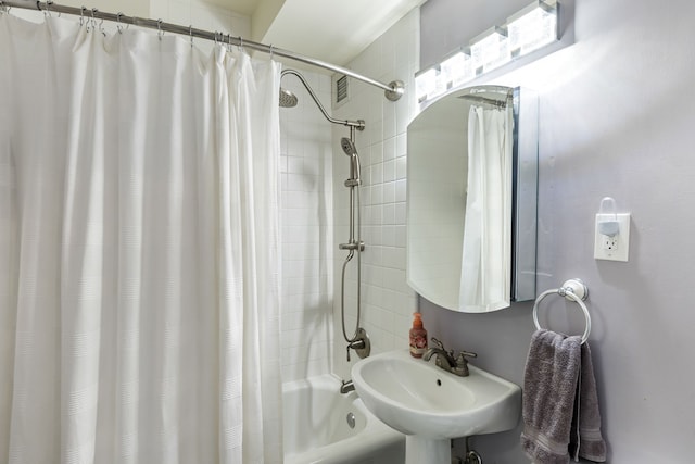 15 Kirby St Unit 826, Detroit, MI 48202 - full bath featuring visible vents, shower / bath combo with shower curtain, and a sink