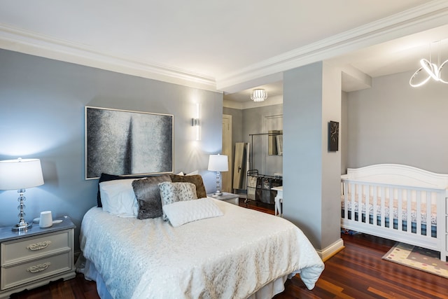 15 Kirby St Unit 826, Detroit, MI 48202 - bedroom with baseboards, a notable chandelier, ornamental molding, and dark wood-type flooring