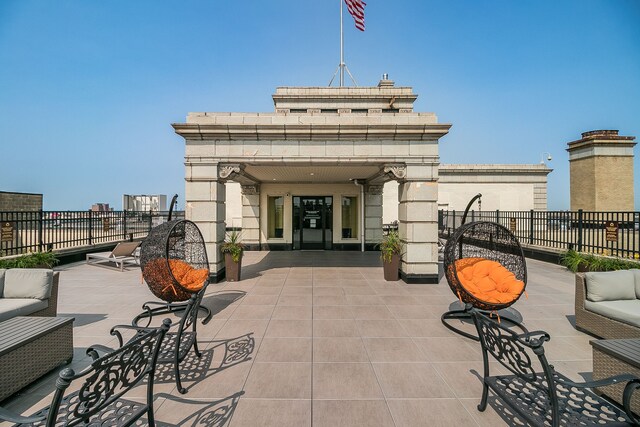 15 Kirby St Unit 826, Detroit, MI 48202 - view of patio / terrace featuring an outdoor hangout area and fence