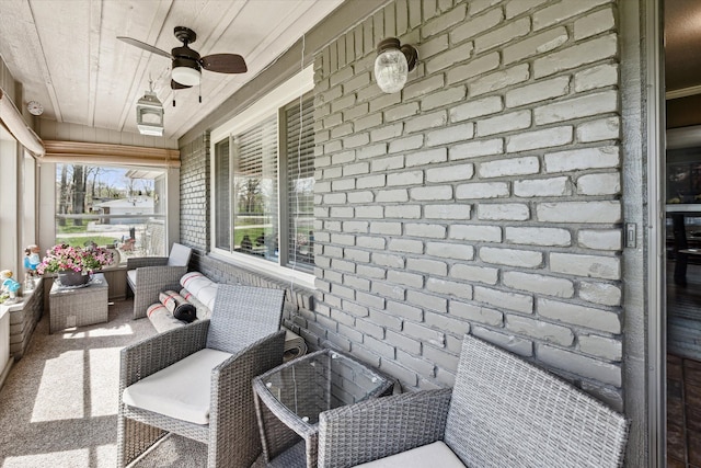 exterior space with ceiling fan