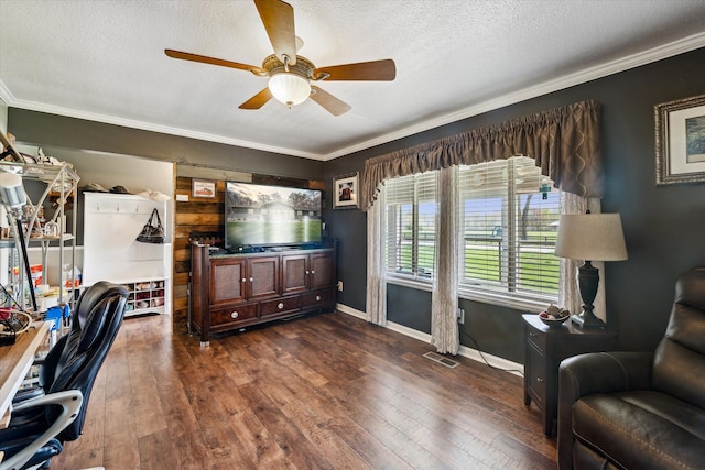 office area featuring ornamental molding, baseboards, ceiling fan, dark wood-type flooring, and a textured ceiling