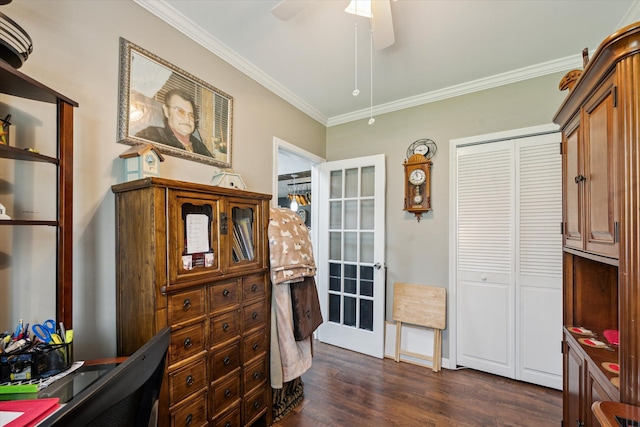 office area featuring crown molding, a ceiling fan, and dark wood finished floors