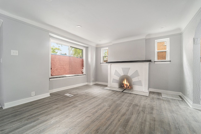 16140 Monte Vista St, Detroit, MI 48221 - unfurnished living room featuring wood finished floors, baseboards, and recessed lighting
