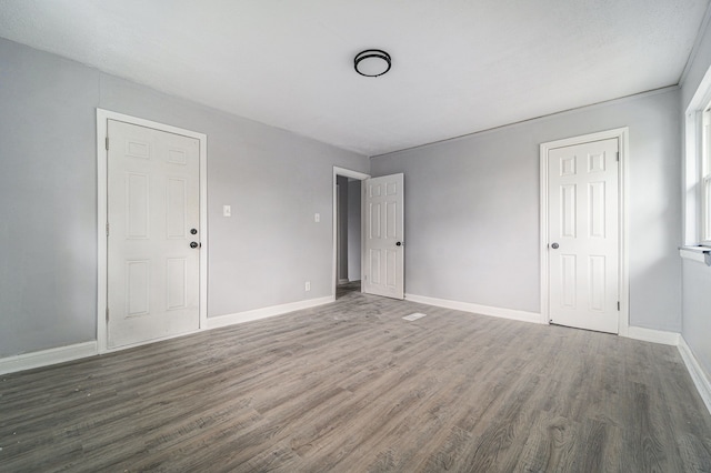 16140 Monte Vista St, Detroit, MI 48221 - unfurnished bedroom featuring wood finished floors and baseboards