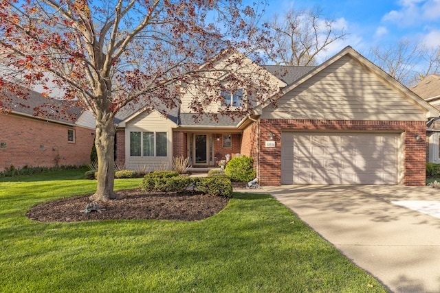 traditional-style house featuring a garage, a front yard, roof with shingles, brick siding, and concrete driveway