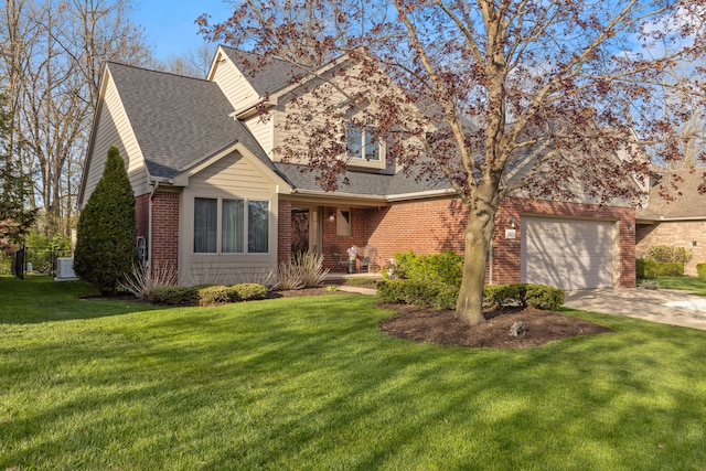 traditional-style home with a garage, a front lawn, brick siding, a shingled roof, and concrete driveway