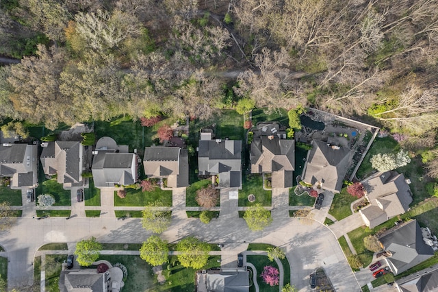 birds eye view of property with a residential view
