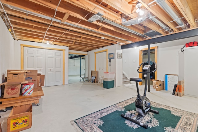 basement featuring stairs