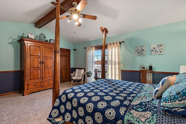 bedroom featuring baseboards, lofted ceiling with beams, a ceiling fan, and light colored carpet