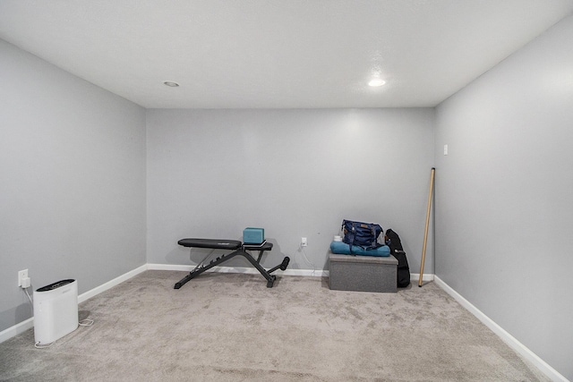 interior space with baseboards, carpet flooring, and recessed lighting