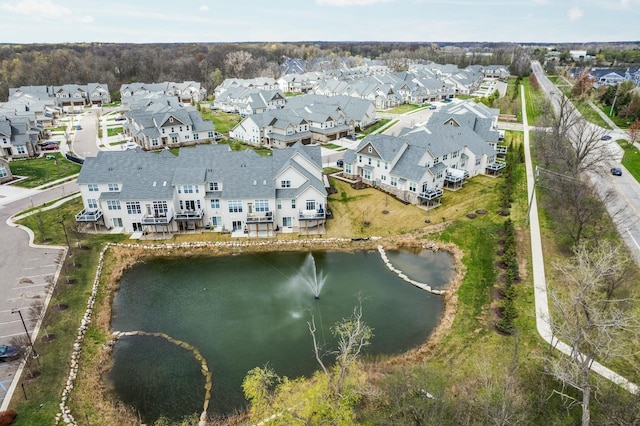 aerial view featuring a water view and a residential view