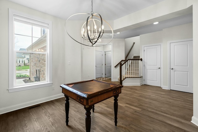office area featuring recessed lighting, wood finished floors, an inviting chandelier, baseboards, and visible vents