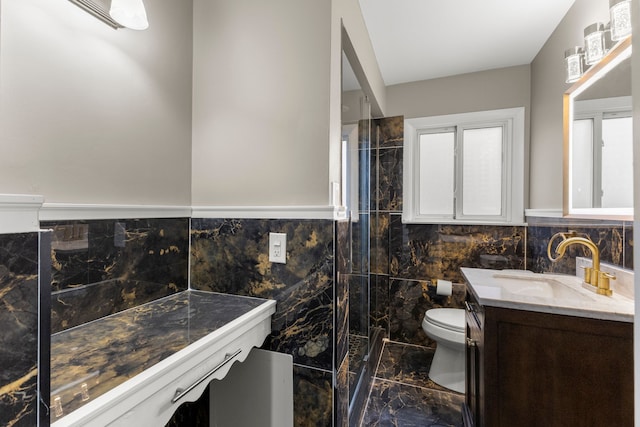 15167 Keppen Ave, Allen Park, MI 48101 - bathroom featuring toilet, tile walls, marble finish floor, and vanity