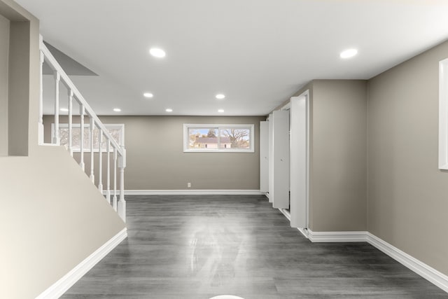 15167 Keppen Ave, Allen Park, MI 48101 - below grade area featuring dark wood-style flooring, baseboards, recessed lighting, and stairway