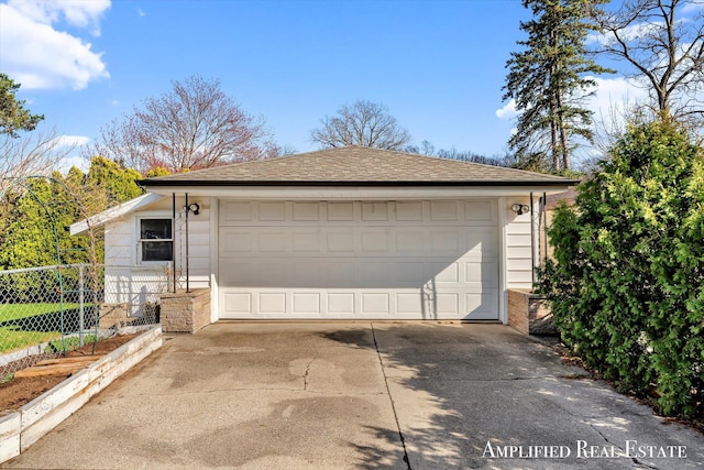 detached garage with fence