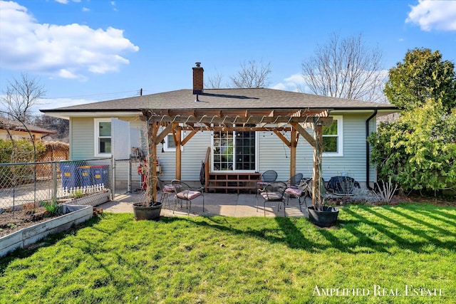 back of property with a chimney, a patio area, a pergola, fence, and a yard