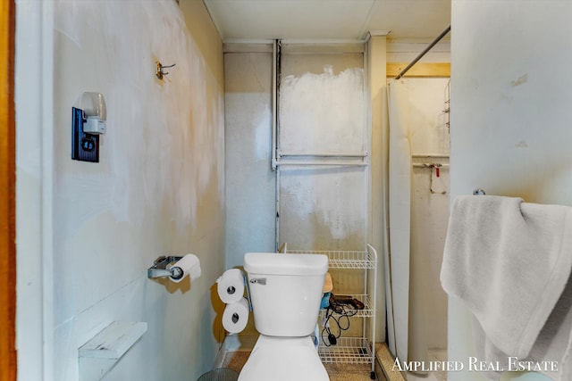 full bath with toilet and a shower