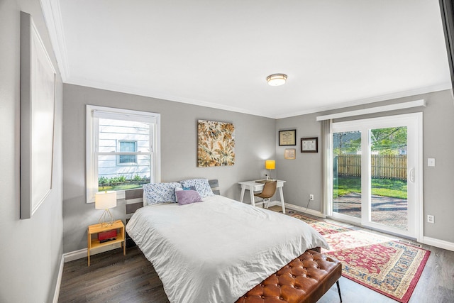 bedroom featuring crown molding, baseboards, access to exterior, and wood finished floors