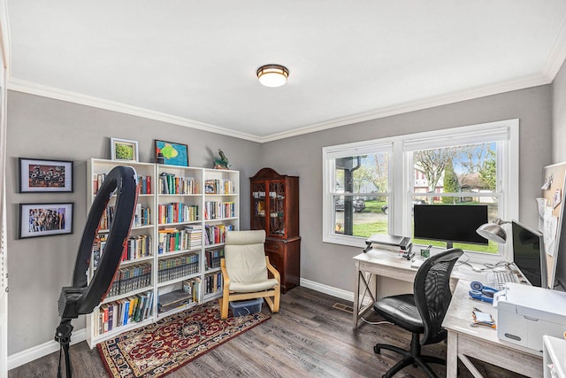 home office with crown molding, baseboards, and wood finished floors