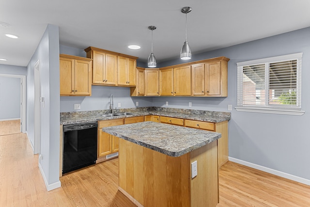 kitchen featuring baseboards, a center island, light wood-type flooring, a sink, and dishwasher