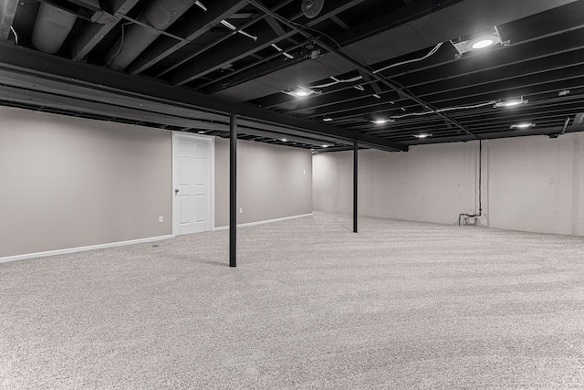 finished basement featuring carpet