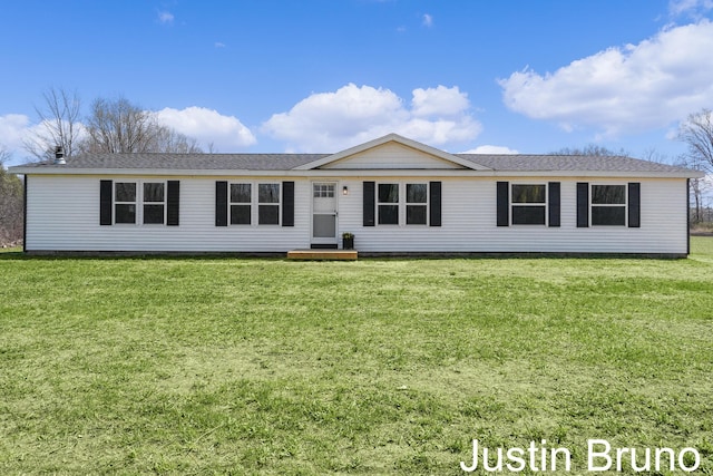 ranch-style house with a front yard