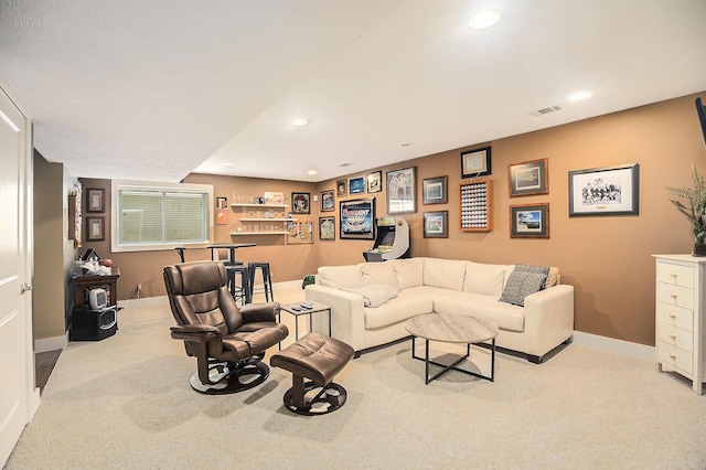 living room with recessed lighting, carpet, and baseboards