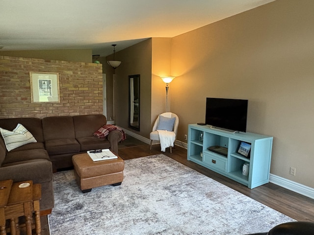 5009 John Holmes Rd, Ann Arbor, MI 48103 - living room with baseboards and dark wood-type flooring