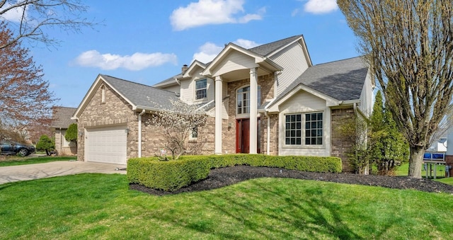 view of front of house featuring brick siding, a front lawn, driveway, and an attached garage