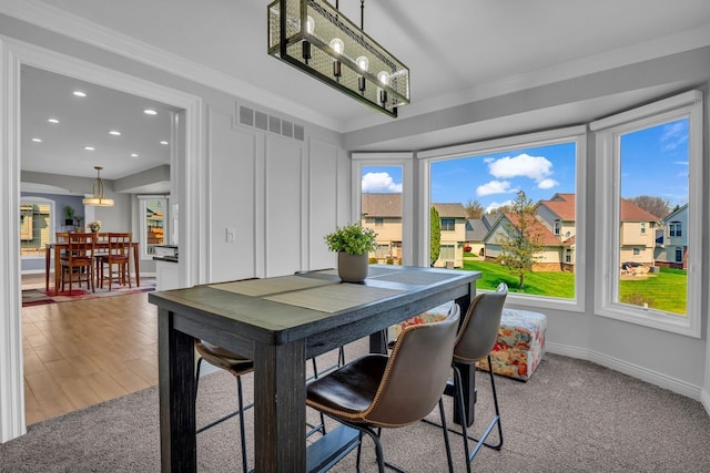 dining area featuring crown molding, visible vents, a chandelier, baseboards, and recessed lighting