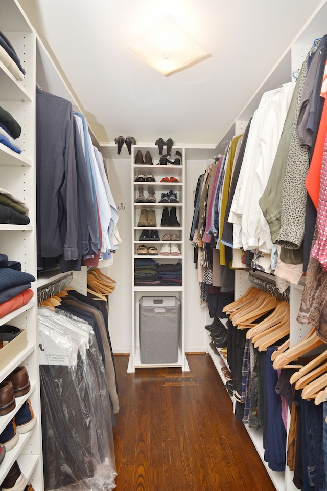 spacious closet featuring wood finished floors