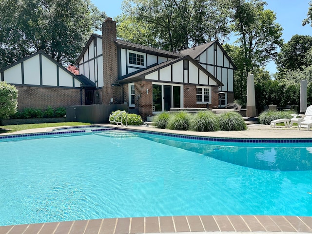 pool with a patio area