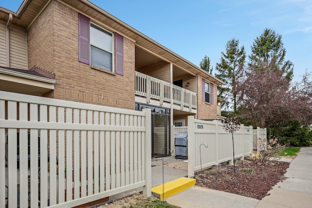 61161 Greenwood Dr, South Lyon, MI 48178 - view of building exterior featuring fence