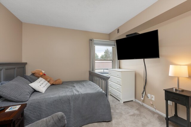 61161 Greenwood Dr, South Lyon, MI 48178 - bedroom with baseboards and light carpet