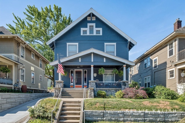 548 Pleasant St SE, Grand Rapids, MI 49503 - american foursquare style home featuring covered porch