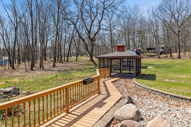 surrounding community featuring a yard and a gazebo
