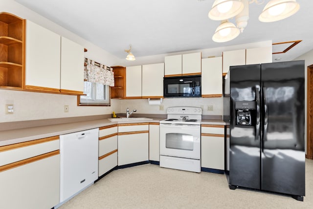 kitchen featuring white cabinetry, open shelves, a sink, light countertops, and black appliances
