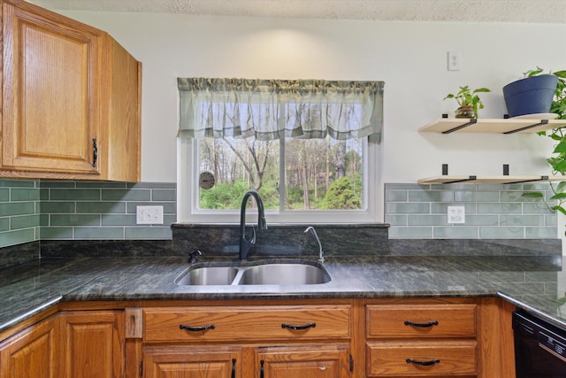 kitchen featuring a sink, dark countertops, decorative backsplash, and open shelves