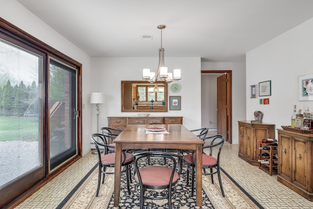 dining room with an inviting chandelier, baseboards, brick patterned floor, and visible vents