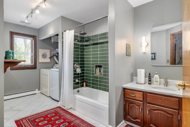 full bathroom featuring shower / bath combo with shower curtain, visible vents, vanity, washer and clothes dryer, and a baseboard heating unit